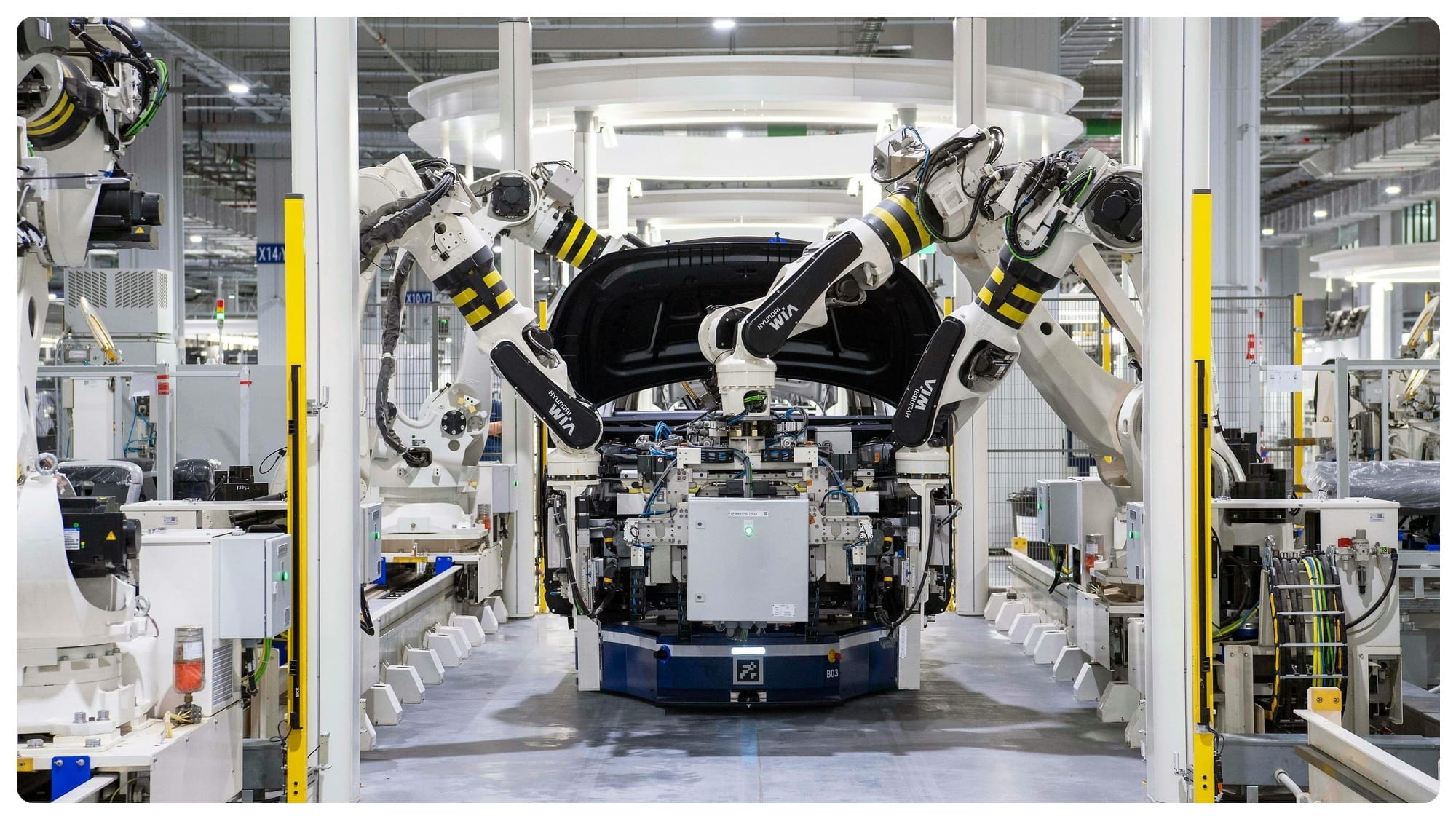 Robots in automated factory for car manufacturing